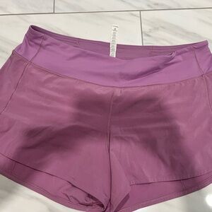 Lululemon size 12 Tall run times shorts 4”